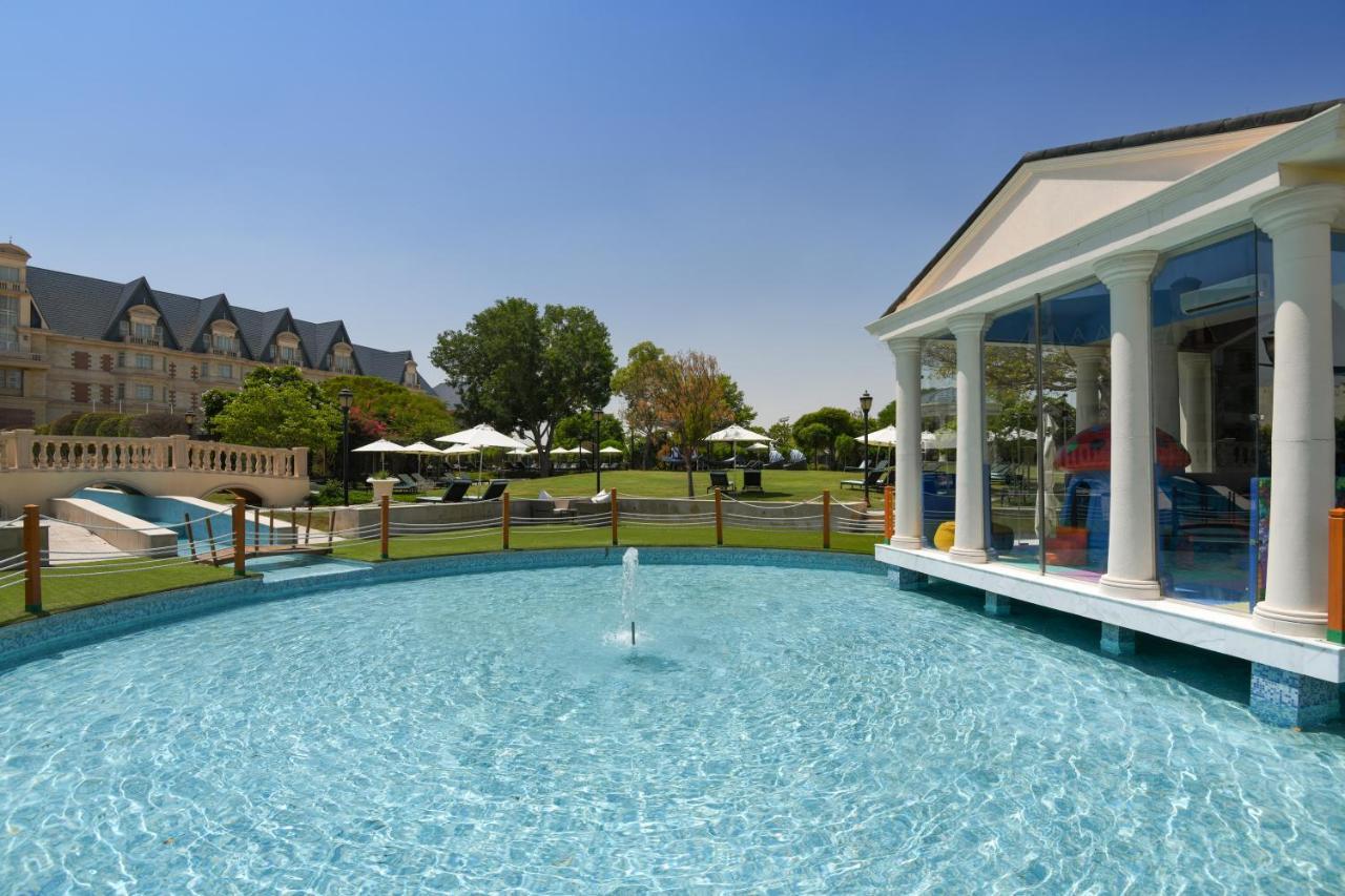 Al Aziziyah Boutique Hotel By The Torch Al Rayyan Exterior photo The swimming pool at the hotel