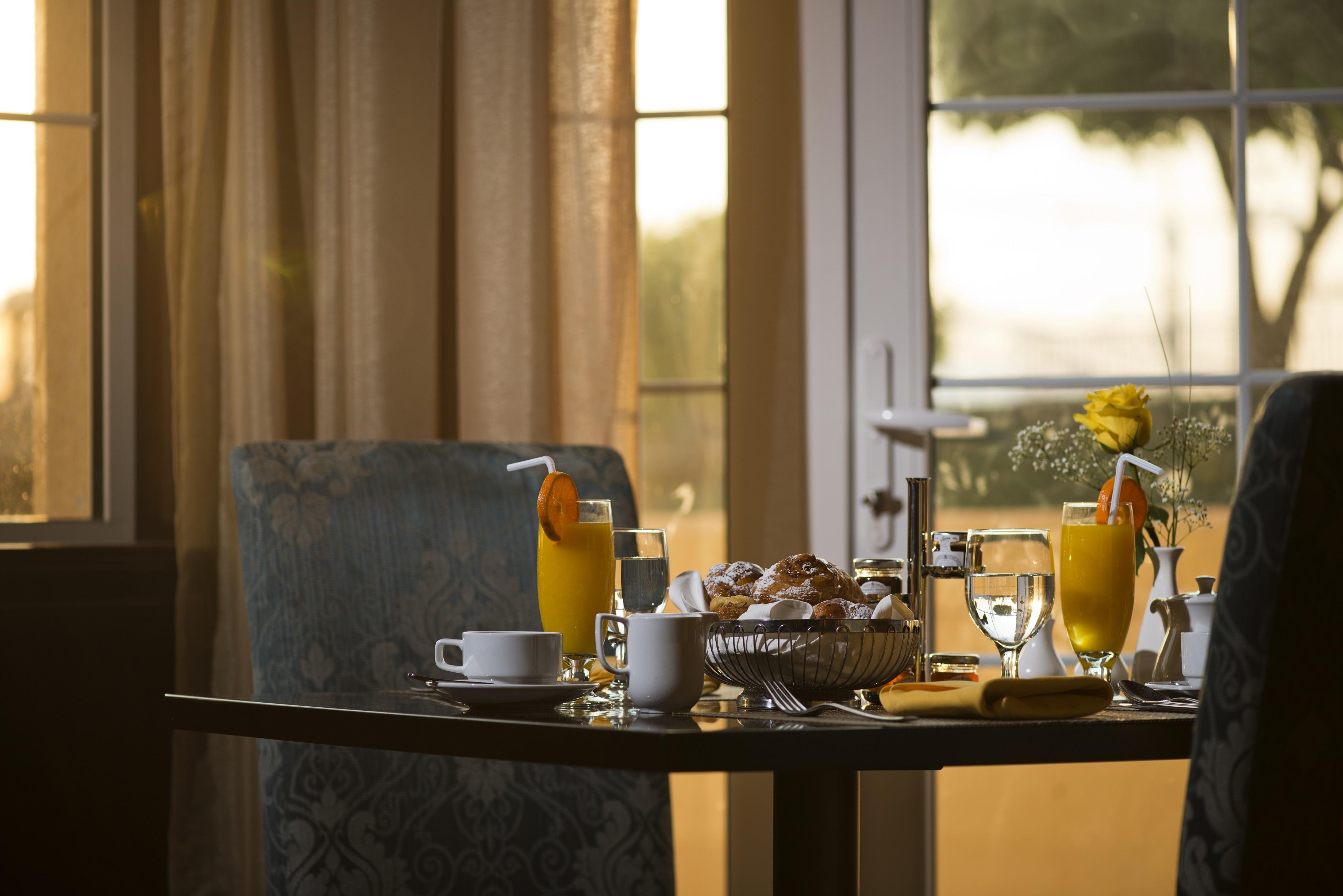Al Aziziyah Boutique Hotel By The Torch Al Rayyan Exterior photo A breakfast table