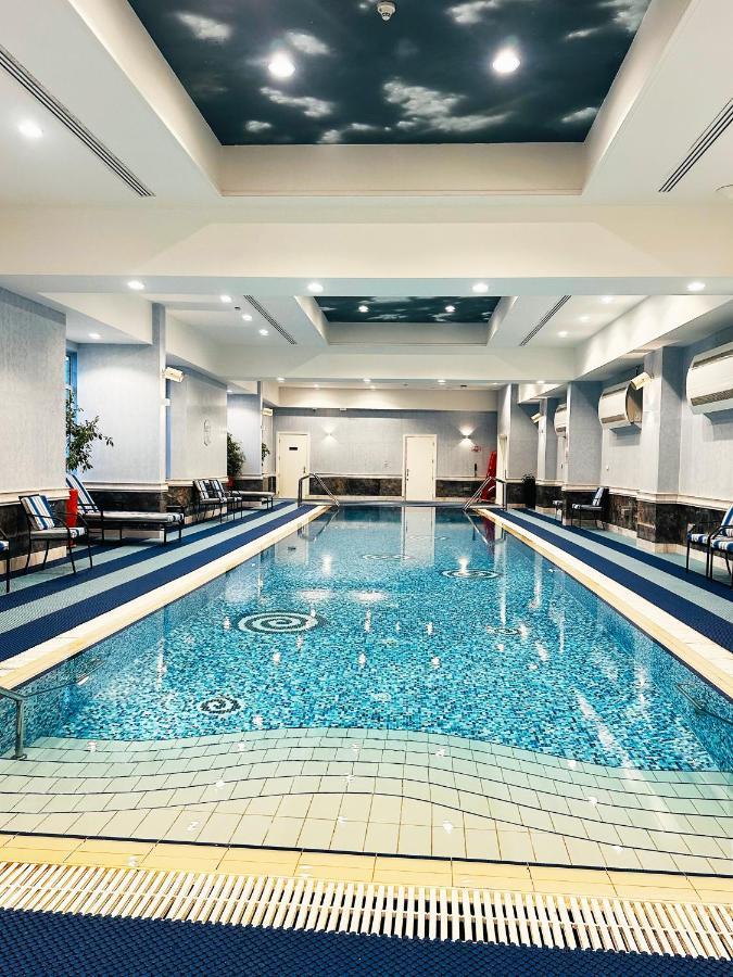 Al Aziziyah Boutique Hotel By The Torch Al Rayyan Exterior photo The pool at the hotel