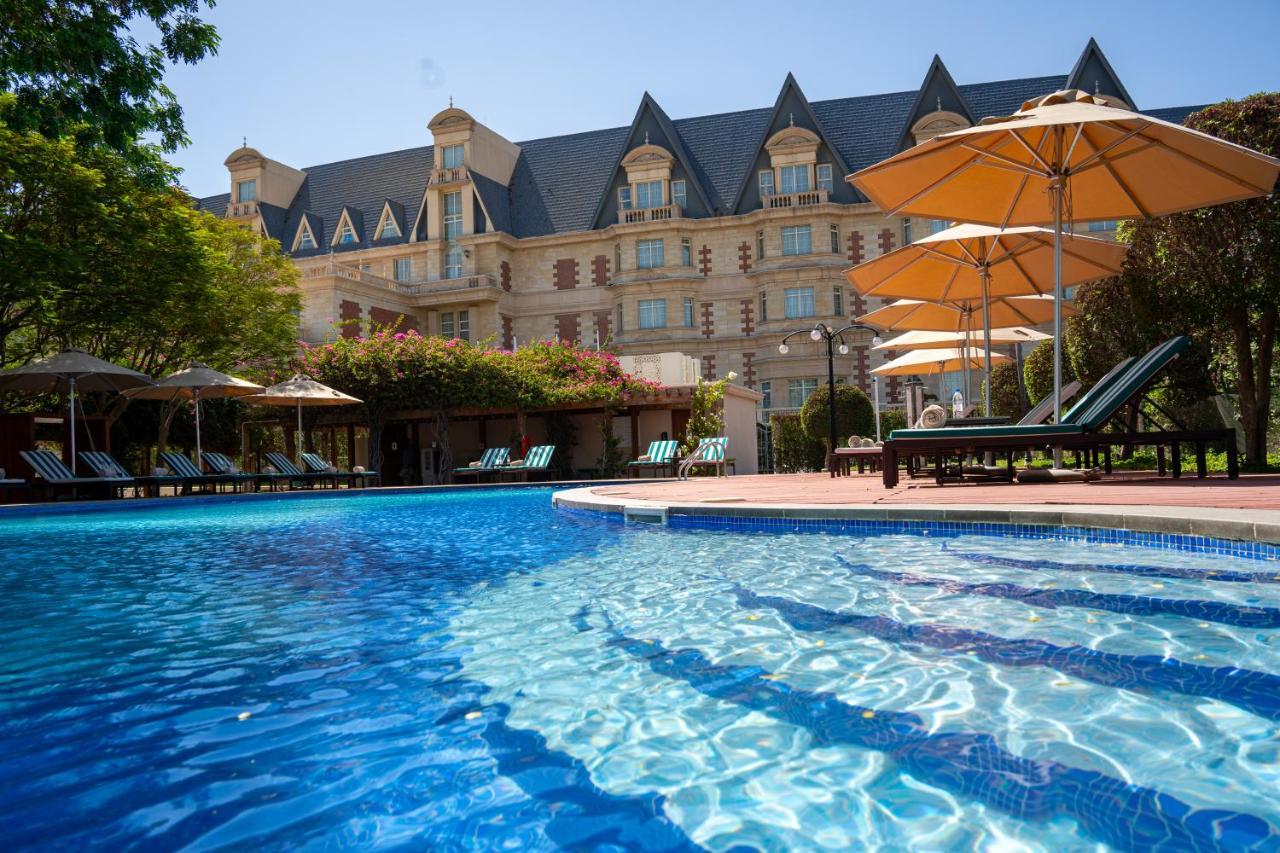 Al Aziziyah Boutique Hotel By The Torch Al Rayyan Exterior photo The Chateau Tongariro